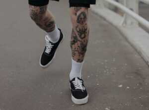 gangster chicano leg tattoos